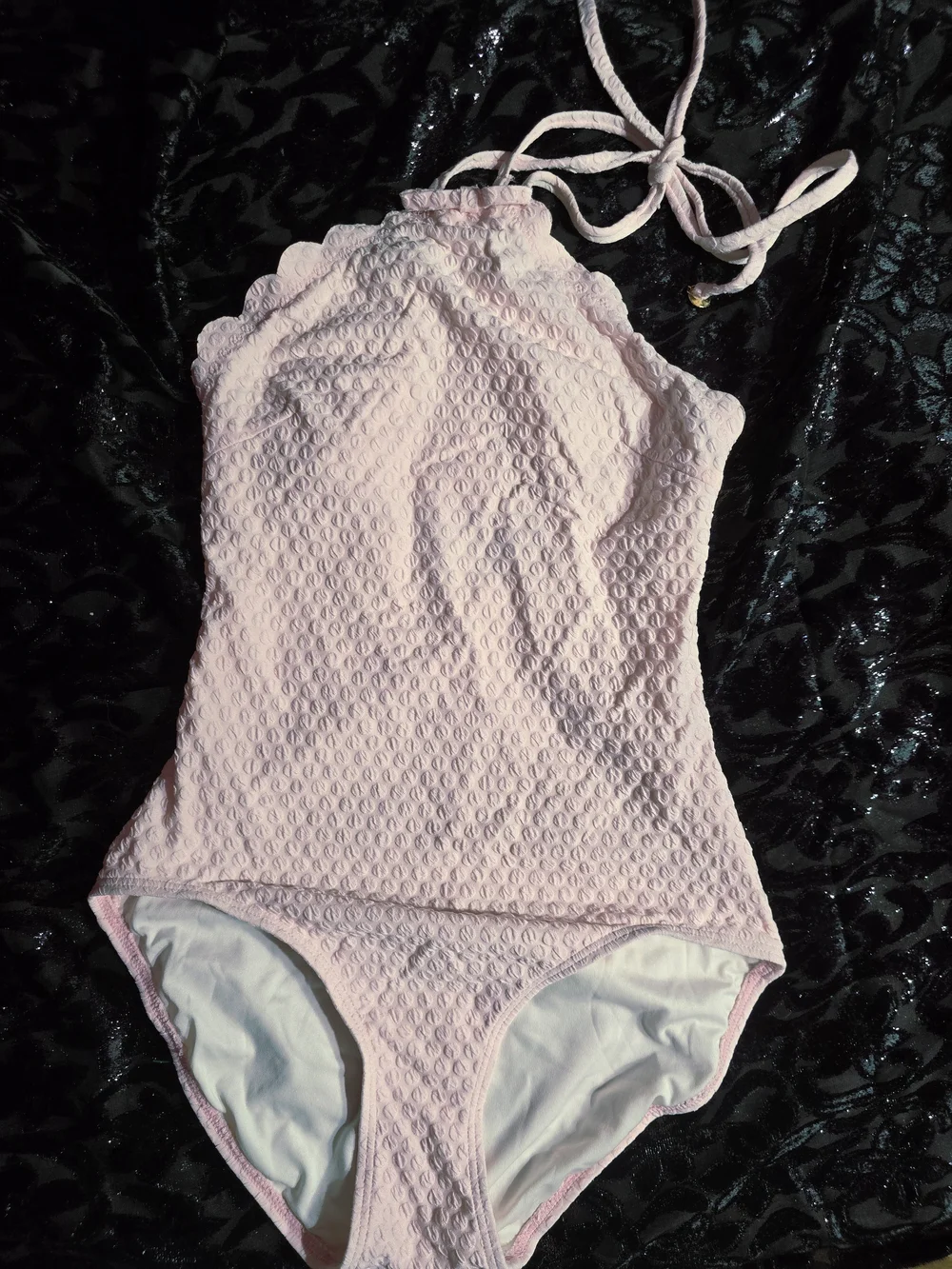 Beautiful Kate Spade New York one-piece swimsuit in a soft baby pink textured
